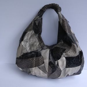 An faux leather handbag.